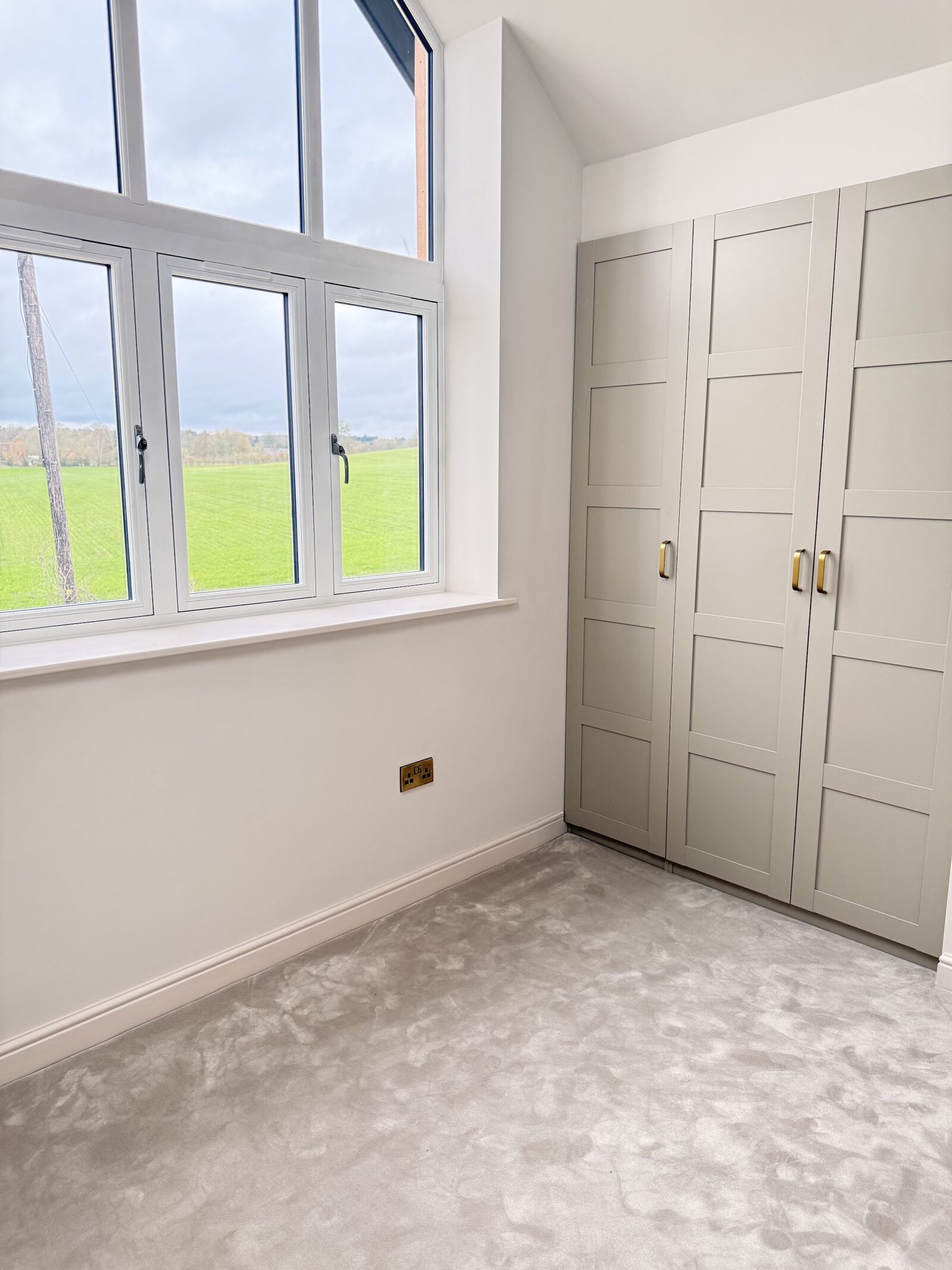 Post-construction cleanup in Solihull, lifting builders dust and marks out of a new-build bedroom carpet